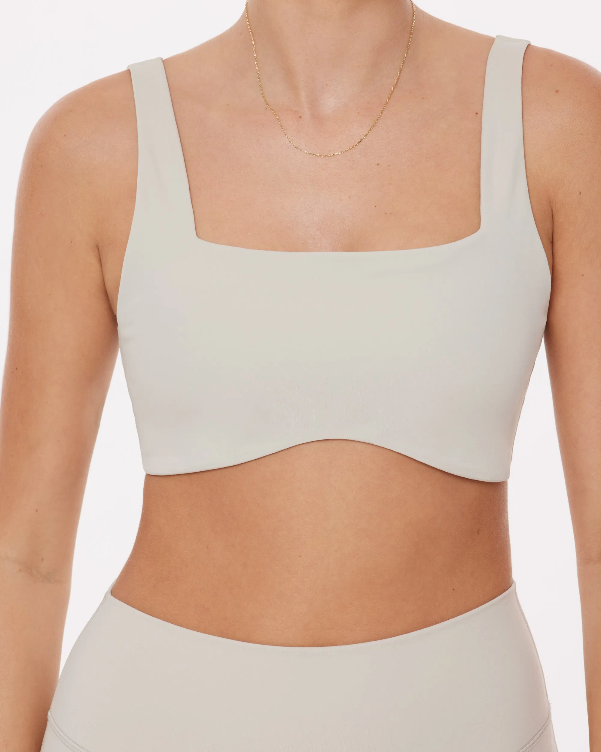 Curve Hem Scoop Neck Padded Sports Bra